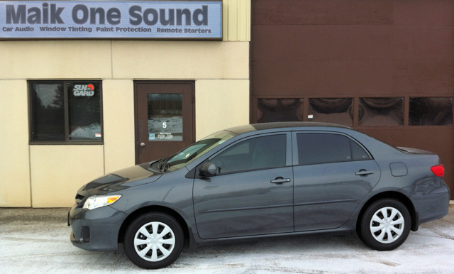 Toyota Corolla 2013 with professional window tint in North Bay